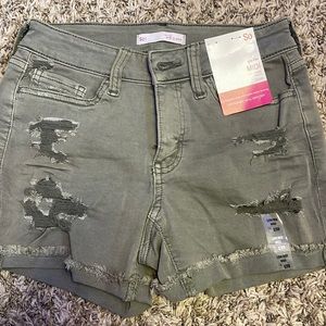 army green ripped shorts